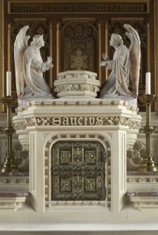 Detail of aumbry on altar.