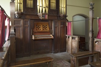 Organ loft and choir benches.
