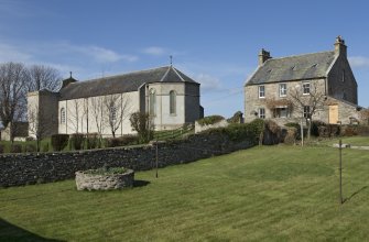 Church and chapel house from south east.