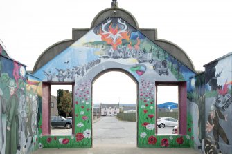 Entrance, mural on south wall (on rear of gable), view from north