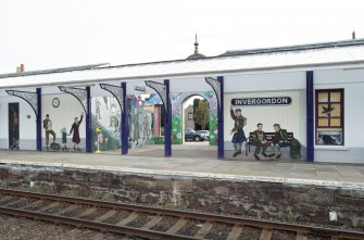 Platform and entrance, view from across tracks to north west