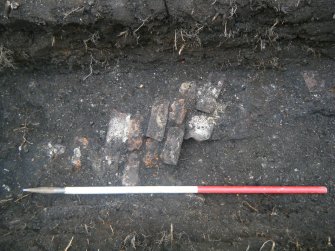 Brick surface, feature 003, photograph from an archaeological excavation at Acheson House, Canongate, Edinburgh