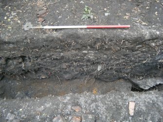 South facing section, photograph from an archaeological excavation at Acheson House, Canongate, Edinburgh