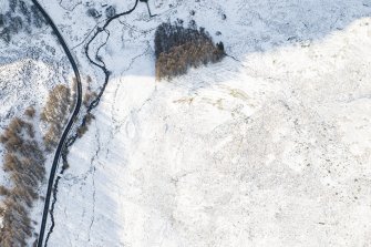 Oblique aerial view of the farmstead, field system and rig at Newton, looking SW.