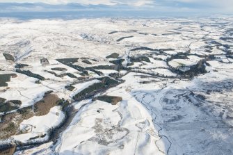 General oblique aerial view centred on the Roman fort at Fendoch, looking NE.