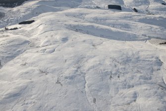 Oblique aerial view of the farmstead and tracks at Corb and Scores Burn, looking S.