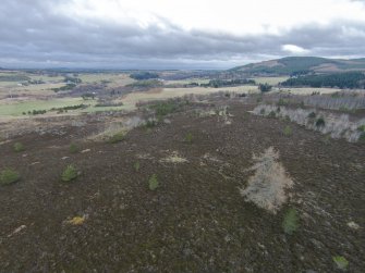 Oblique aerial view of hut circles A and B, looking NE.