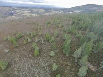 Oblique aerial view of hut-circles G and F, looking NE.