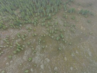 Near vertical view of hut circles F and G, with hollows ways at the right, looking SE.