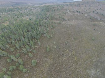 Oblique aerial view of the SE part of the site, looking SE.