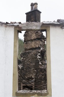 Detail of chimney through window.