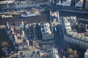 Oblique aerial view of Custom House, Stables and Bernard Street Bridge, looking ESE.