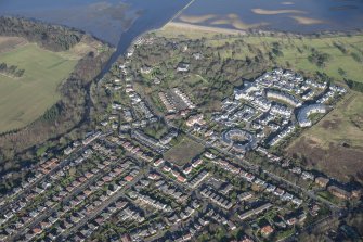 Oblique aerial view of Cramond Village and Dunfermline College of Physical Education, looking NE.