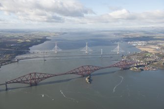 Oblique aerial view of the Forth Road Bridge, Forth Bridge and Queensferry Crossing, looking W.