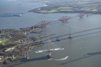 Oblique aerial view of the Forth Road Bridge, Forth Bridge and Queensferry Crossing, looking ESE.