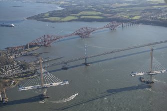 Oblique aerial view of the Forth Road Bridge, Forth Bridge and Queensferry Crossing, looking ESE.