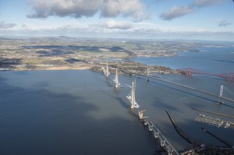 Oblique aerial view of the Forth Road Bridge, Forth Bridge and Queensferry Crossing, looking ENE.