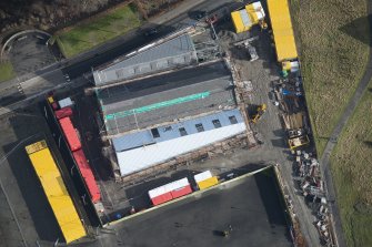 Oblique aerial view of The Engine Shed under construction, looking E.