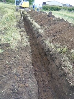 Final 100m of the cable trench facing west, photograph from archaeological watching brief at Southfield Farm, Dalkeith