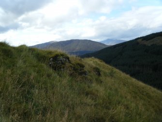Vitrified blocks of masonry along outside of north rampart, photograph of Dun Deardail, from a topographic archaeological survey at five Pictish Forts in the Highlands