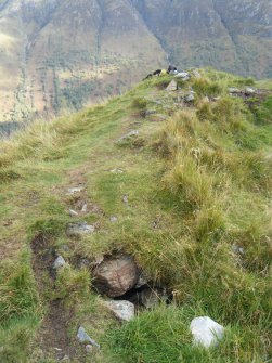 Patches of slight erosion in path along north rampart, photograph of Dun Deardail, from a topographic archaeological survey at five Pictish Forts in the Highlands