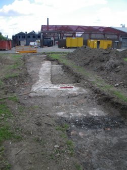 Trench 3 - Concrete foundations, photograph from final report on an archaeological evaluation at Main Street, Bridgeton