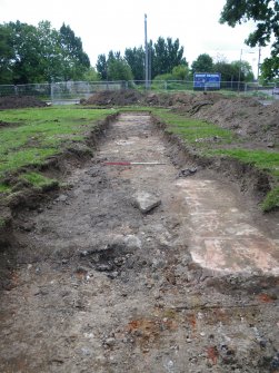 Trench 4 - Possible base and rubble deposits, photograph from final report on an archaeological evaluation at Main Street, Bridgeton