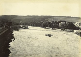 View of the River Tweed looking upstream with Neidpath Castle visible in the distance