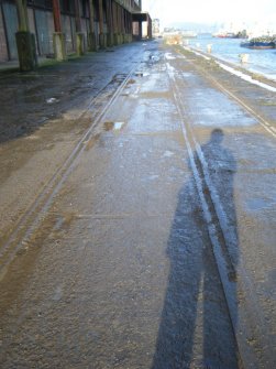 View of the rail tracks and cobble quay, during archaeological monitoring at James Warr Dock, Greenock