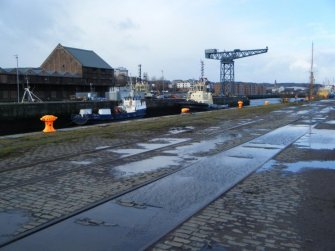 View of the central quay, during archaeological monitoring at James Warr Dock, Greenock
