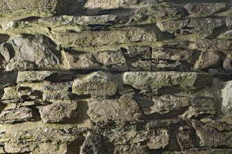 Detail of carved graffiti on inside of south wall