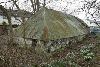 View of cottage from north east showing hipped roof