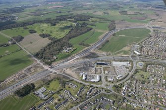 Oblique aerial view of the A90 road junction, road works for the Queensferry Crossing, Dundas Castle Golf Course and Newbigging Steading, looking WSW.
