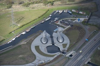 Oblique aerial view of The Kelpies, looking NW.