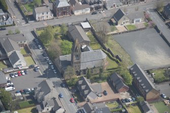 Oblique aerial view of St Ignatius' Catholic Church, looking ENE.