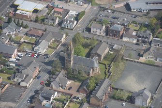 Oblique aerial view of St Ignatius' Catholic Church, looking NE.
