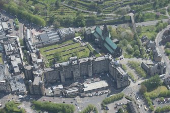 Oblique aerial view of Cathedral of St Mungo Burial Ground, Glasgow Cathedral and the Royal Infirmary, looking E.