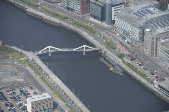 Oblique aerial view of Tradeston Footbridge, looking NW.