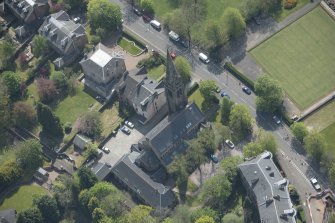 Oblique aerial view of Queen's Park Church and Hall, looking SSE
