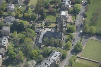 Oblique aerial view of Queen's Park Church and Hall, looking SE.