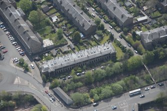 Oblique aerial view of 36 Ibrox Terrace, Strathbungo Station and Moray Place, looking SSE.