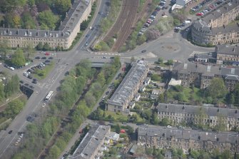 Oblique aerial view of 36 Ibrox Terrace, Strathbungo Station and Moray Place, looking NE.