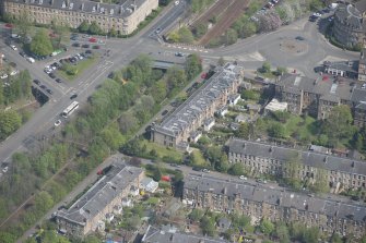 Oblique aerial view of 36 Ibrox Terrace, Strathbungo Station and Moray Place, looking NNE.