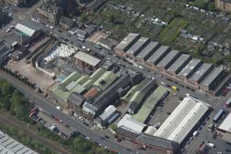 Oblique aerial view of Darnley Street Printing Works, looking WSW.