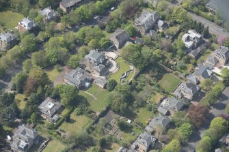 Oblique aerial view of Castlehill and Ellisland villas, looking SE.