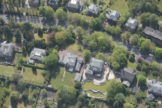 Oblique aerial view of Castlehill and Ellisland villas, looking SSE.