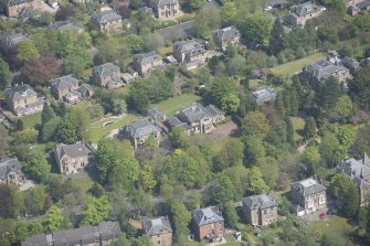 Oblique aerial view of Castlehill and Ellisland villas, looking NE.