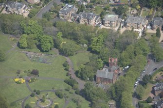 Oblique aerial view of Pollokshields Burgh Hall, looking NNE.