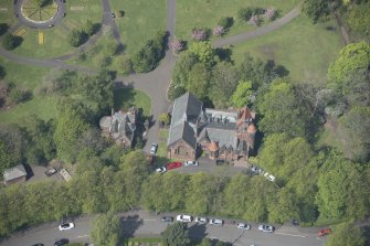Oblique aerial view of Pollokshields Burgh Hall, looking NW.