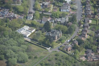 Oblique aerial view of 124 Springkell Avenue, looking E.